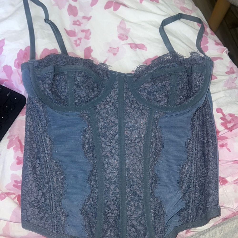 This top is from urban outfitters out from under Mordor. Love corset size small